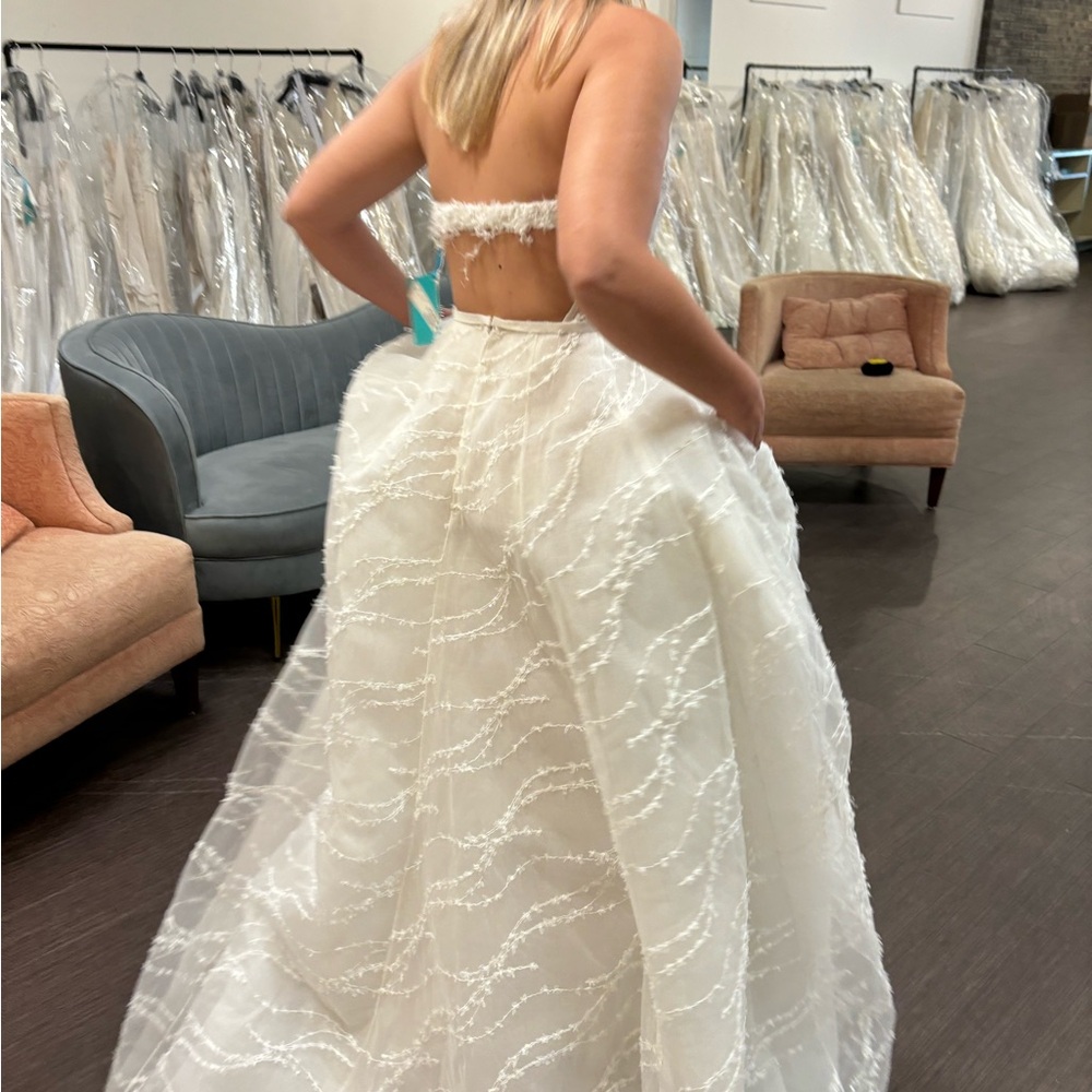Mira Zwillinger Marvel
Elegant White Strapless Wedding Dress - Picture 6 of 16